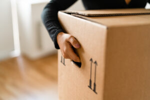 carrying a moving box